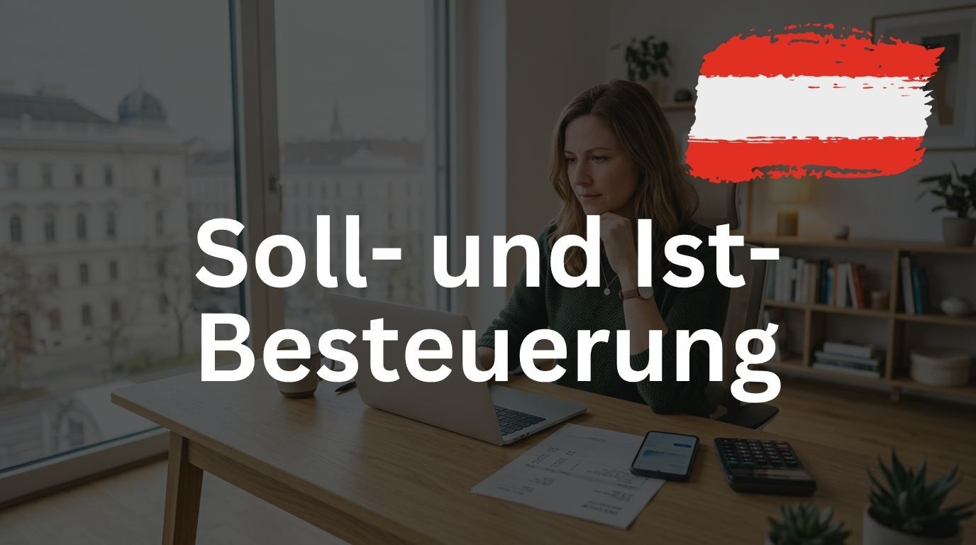 Unternehmerin sitzt nachdenklich am Laptop in einem Büro in Wien, vor ihr Rechnung, Smartphone und Taschenrechner – Titelbild Soll- und Istbesteuerung in Österreich.